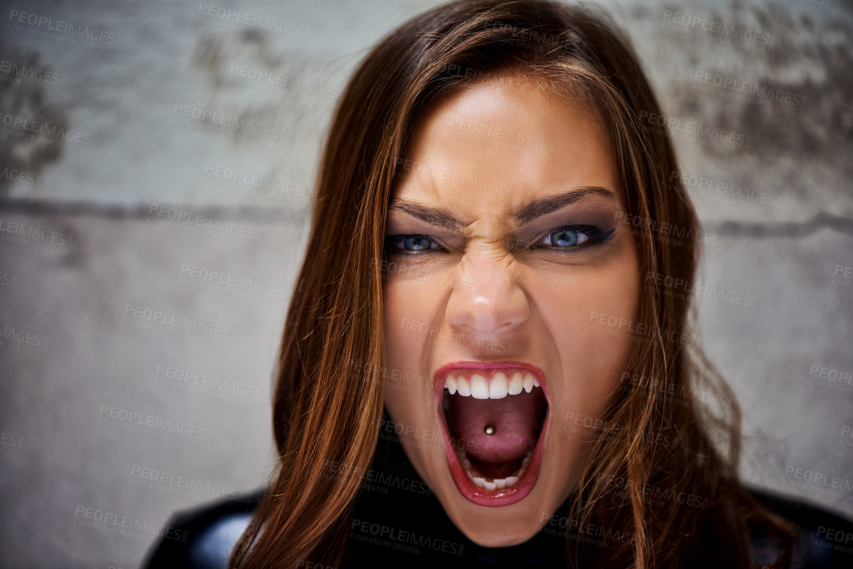 Buy stock photo Beautiful young woman screaming violently while looking at you