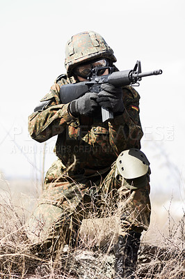 Buy stock photo Soldier man, machine gun and outdoor with aim, field and nature for war, fight and army in countryside. Military service, battlefield and agent with weapon, gear and helmet for conflict in Ukraine
