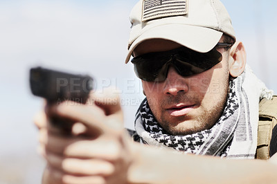 Buy stock photo Violence, danger and a man shooting a gun with a target, military training and army service. Serious, risk and a fearless person or shooter with weapon for a violent crime or practice at shoot range
