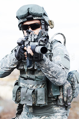 Buy stock photo Soldier man, gun and outdoor with aim, field and nature for war, fight and army in countryside. Military service, battlefield and agent with machine weapon, gear and helmet for conflict in Ukraine