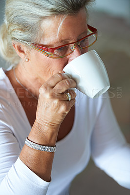 Buy stock photo Mature, woman and coffee for morning breakfast in home for relax rest, espresso for calm. Female person, hot drink or cup for peace as holiday casual or break for senior love retirement, latte in mug