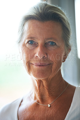 Buy stock photo A pretty senior woman smiling at you