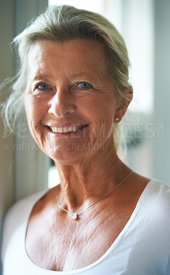 Buy stock photo Attractive elderly woman looking at you with a smile