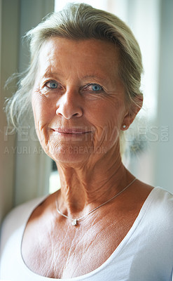 Buy stock photo Senior, woman and portrait for natural beauty confidence in age care, grace wrinkles in home. Old person, face and pride eyes in retirement as pensioner in house for calm peace, rest memory or relax