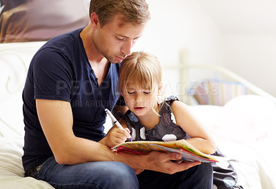 Buy stock photo Family, father and daughter with homework for helping, bonding and learning for education in bedroom of home. People, man and girl child with homeschooling, writing in book and care on bed of house