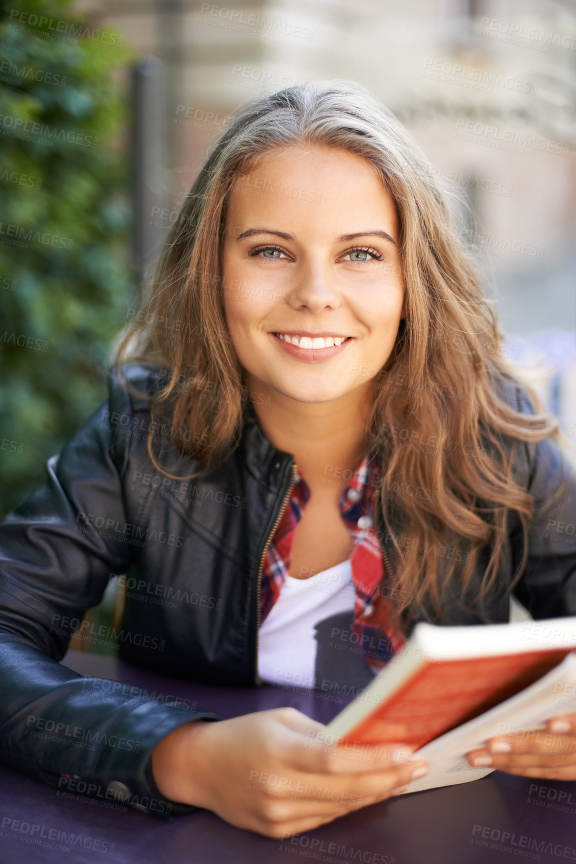 Buy stock photo College student, portrait and reading a book at cafe on university, campus or restaurant. Happy, woman and learning from studying books, textbook or relax with  knowledge at outdoor coffee shop