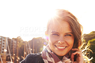 Buy stock photo Happy, woman and portrait in town at sunrise in autumn or spring on holiday, travel or vacation. Face, smile and girl relax on adventure with golden, sunshine and dawn light in city and morning