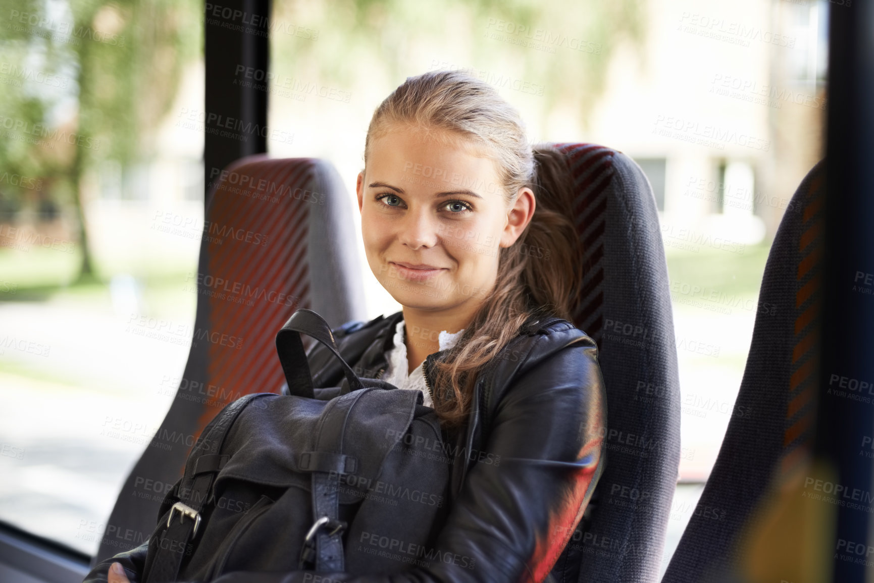 Buy stock photo Student, portrait and transport to school on bus with a backpack and smile for education. Teenager, girl and happy journey on public transportation or travel to college, campus and university