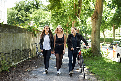 Buy stock photo Three friends walking home from school