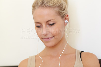 Buy stock photo College student, woman and listening to music with earphones and relax with technology in home. Streaming, radio or podcast audio with headphones, tech and hearing sound with a calm face in apartment