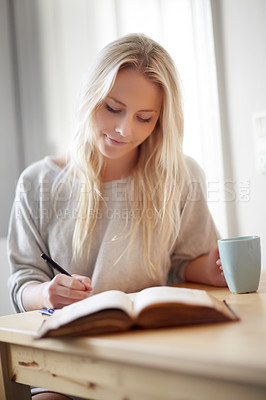 Buy stock photo Coffee, relax and woman writing in a book at home for idea, planning or creative, research or diary. Notebook, education and female student in a house with tea while brainstorming homework assignment