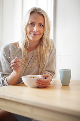 Buy stock photo Portrait, home and woman with breakfast, cereal and start the day with nutrition, coffee and morning. Face, person and girl with a bowl, tea and eating with food, wellness and healthy with a smile