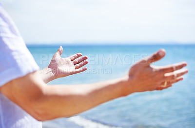 Buy stock photo Hands, worship and man at the sea with happiness and praise God for blessing, water and spiritual peace. Person, closeup or respect Jesus Christ with gratitude, freedom and hope at the ocean or beach