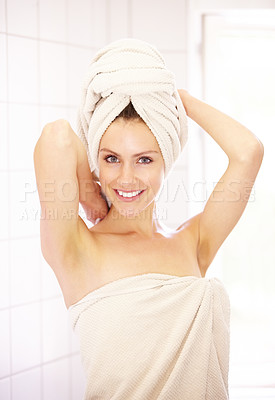 Buy stock photo Portrait, towel and woman with a smile, bathroom and washing with wellness, treatment and grooming. Face, person and home with beauty, skincare and morning with hygiene, clean and health with luxury