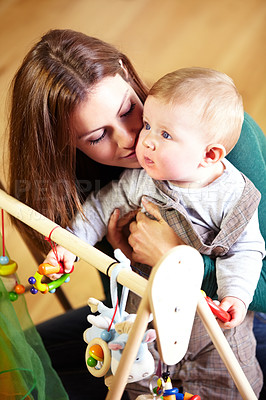 Buy stock photo Woman, baby and holding for playing with toys in living room for childhood development in home. Mother, son and bonding for love, trust or together by support in growth, future and hope with care