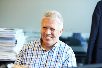 Buy stock photo Portrait of a senior businessman sitting in his office