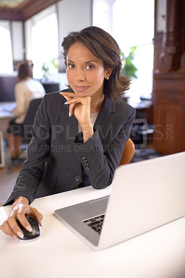 Buy stock photo Portrait of an attractive businesswoman sitting at her desk
