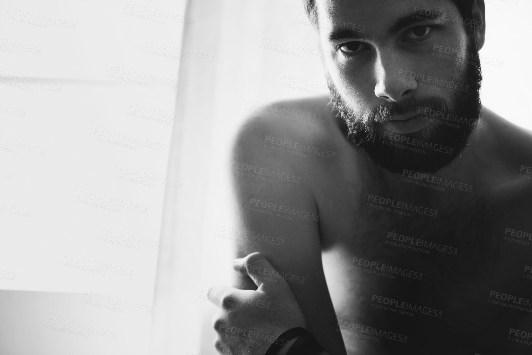 Buy stock photo Man, bedroom and portrait with thinking and stress with black and white and beard at home. Art and male model in a house with a problem and anxiety with lonely grief and monochrome and mockup space