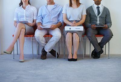 Buy stock photo Legs, recruitment and business people in line for job interview, hiring and waiting in a room. Human resources, meeting and candidates in a row in office for onboarding process at a startup company