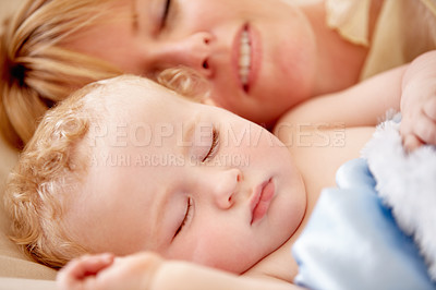 Buy stock photo Sleeping, mom and calm baby in bed together with peace, happiness and love for infant in morning nap. Mother, cuddle and sleep with child in closeup and rest with a smile in bedroom or family home