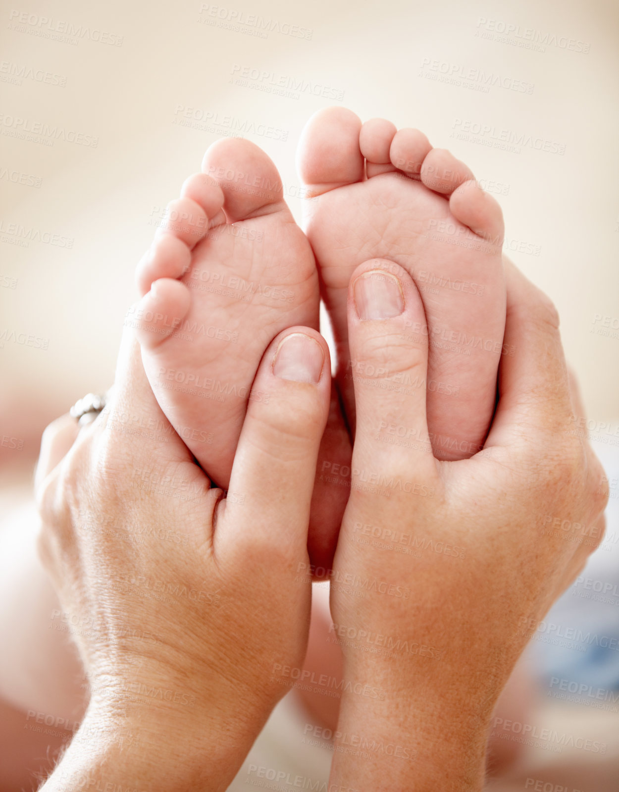 Buy stock photo Feet, baby and closeup of hands of mother in a house with love, care and support, nurture and protection. Family, zoom and toes of kid with parent at home for child development, bonding and comfort