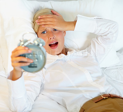 Buy stock photo Alarm, sleeping and woman with surprise in bed awake, oversleep and late for working at home. Stress, anxiety and business person shocked for snooze, time and clock for career, job or work in morning