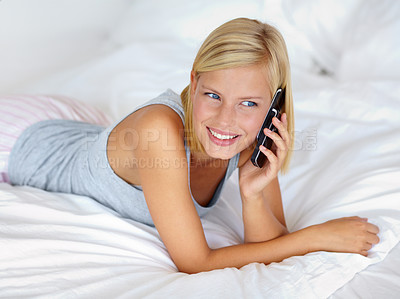 Buy stock photo Relax, communication and phone call with woman on bedroom for contact, smile and connection. Happy, digital and technology with female person in home for calm, listening and mobile conversation