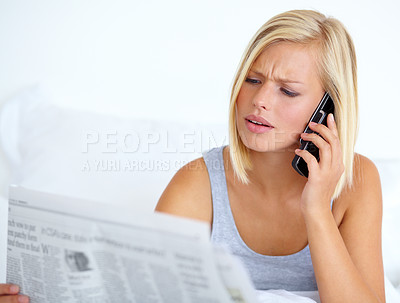 Buy stock photo Phone call, newspaper and woman with reading, conversation and internet with connection, home and information. Person, apartment and girl with a smartphone, contact and bedroom with communication