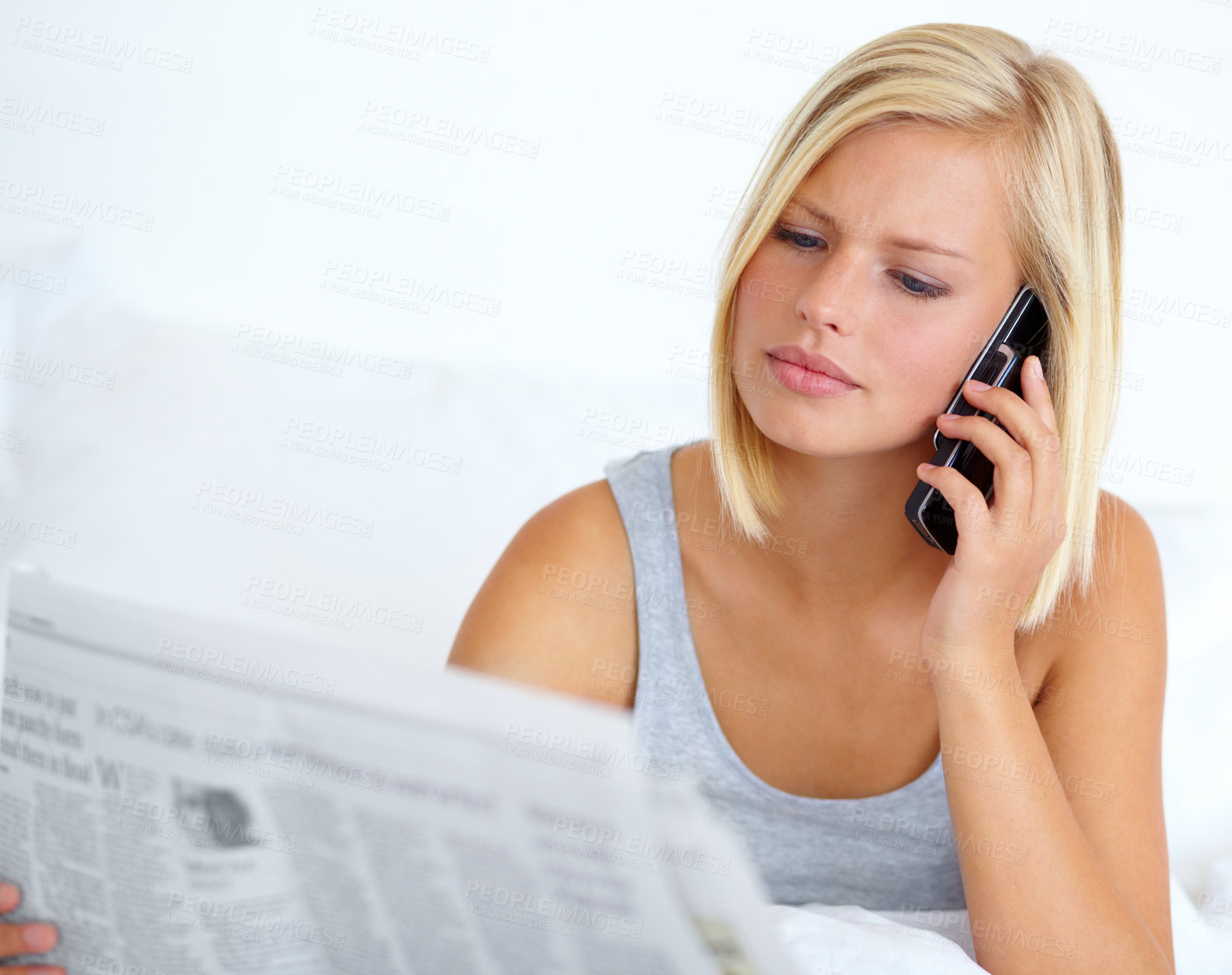 Buy stock photo Phone call, newspaper and woman with reading, connection and internet with communication, home and information. Person, apartment and girl with a smartphone, contact and bedroom with conversation