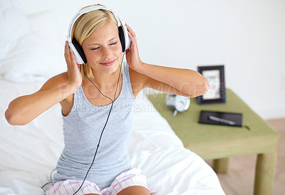 Buy stock photo Home, headphones and woman with music, bedroom and streaming sound with radio, peace and listening. Zen person, technology and girl with headset, podcast audio and playlist with connection and song