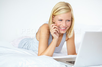 Buy stock photo Happy, laptop and woman on bed for watching movies, online shopping and internet in bedroom. Relax, smile and person on computer for streaming subscription, videos and series on weekend at home