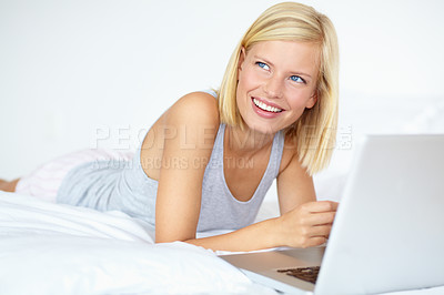 Buy stock photo Thinking, home and woman with a laptop, ideas and planning with happiness, solution or website information. Person, apartment or girl with a pc, decision or typing with a choice, daydreaming or smile