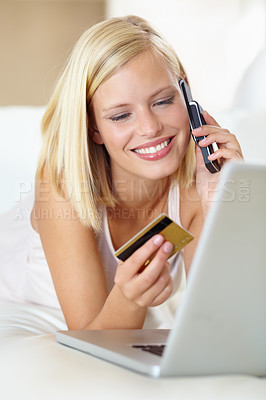Buy stock photo Phone call, sofa and happy woman with laptop, credit card and online shopping with payment in home. Ecommerce, crm and girl on couch with cellphone for deal, offer or internet sale in living room.