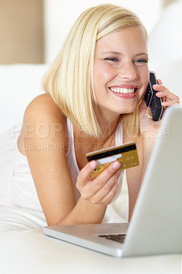 Buy stock photo Phone call, happy and woman with laptop, credit card and online shopping payment in home. Ecommerce, crm and girl on sofa on cellphone discussion for deal, offer or internet sale in living room