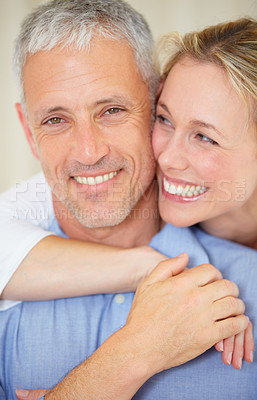 Buy stock photo Happy couple, portrait and hug for love, support or care in romance together on holiday weekend at home. Face of mature married woman hugging man with smile in embrace, bonding or honeymoon at house
