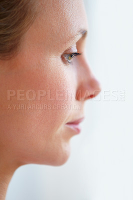 Buy stock photo Pensive mature woman looking away - profile view