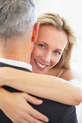 Buy stock photo Happy woman, portrait and hug in marriage, love or embrace for honeymoon, romance or care together. Female person or bride hugging groom with smile in joy for wedding, support or trust in commitment