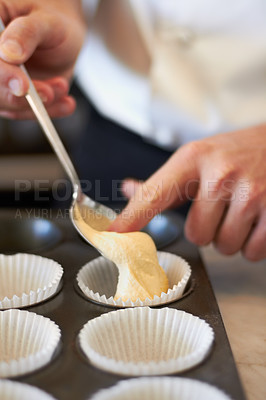 Buy stock photo Closeup, hands and muffin dough in tray with baker, small business owner and professional chef. Cooking, bakery and cake in baking pan for food, job or start process for cupcake in restaurant kitchen