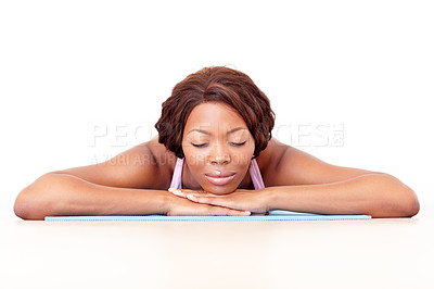 Buy stock photo Woman, studio floor and yoga with sleep, peace and zen for wellness, training and mindfulness by white background. Isolated african lady and sleeping on mat for calm, relax and meditation