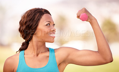 Buy stock photo African woman, dumbbell workout and outdoor with smile, strong arm muscle and focus for wellness, Girl, training and fitness in park, garden or backyard with pride, weightlifting and flex for health