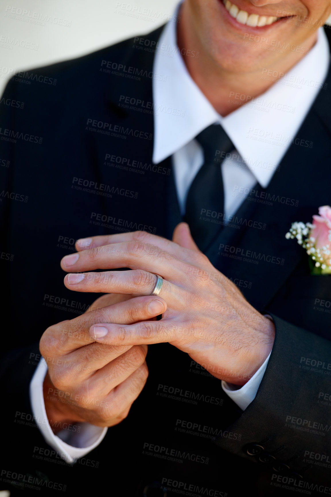 Buy stock photo Hands, groom man and ring for wedding, celebration and commitment to relationship, smile and pride. Person, metal jewelry and tuxedo suit for marriage, happy and closeup at event, party or reception