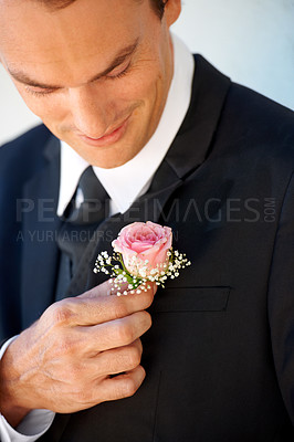 Buy stock photo Groom man, boutonniere or flowers on suit for style for pride, smile or ready at wedding, party or celebration. Person, excited or rose on tuxedo for thinking, preparation or happy for marriage event