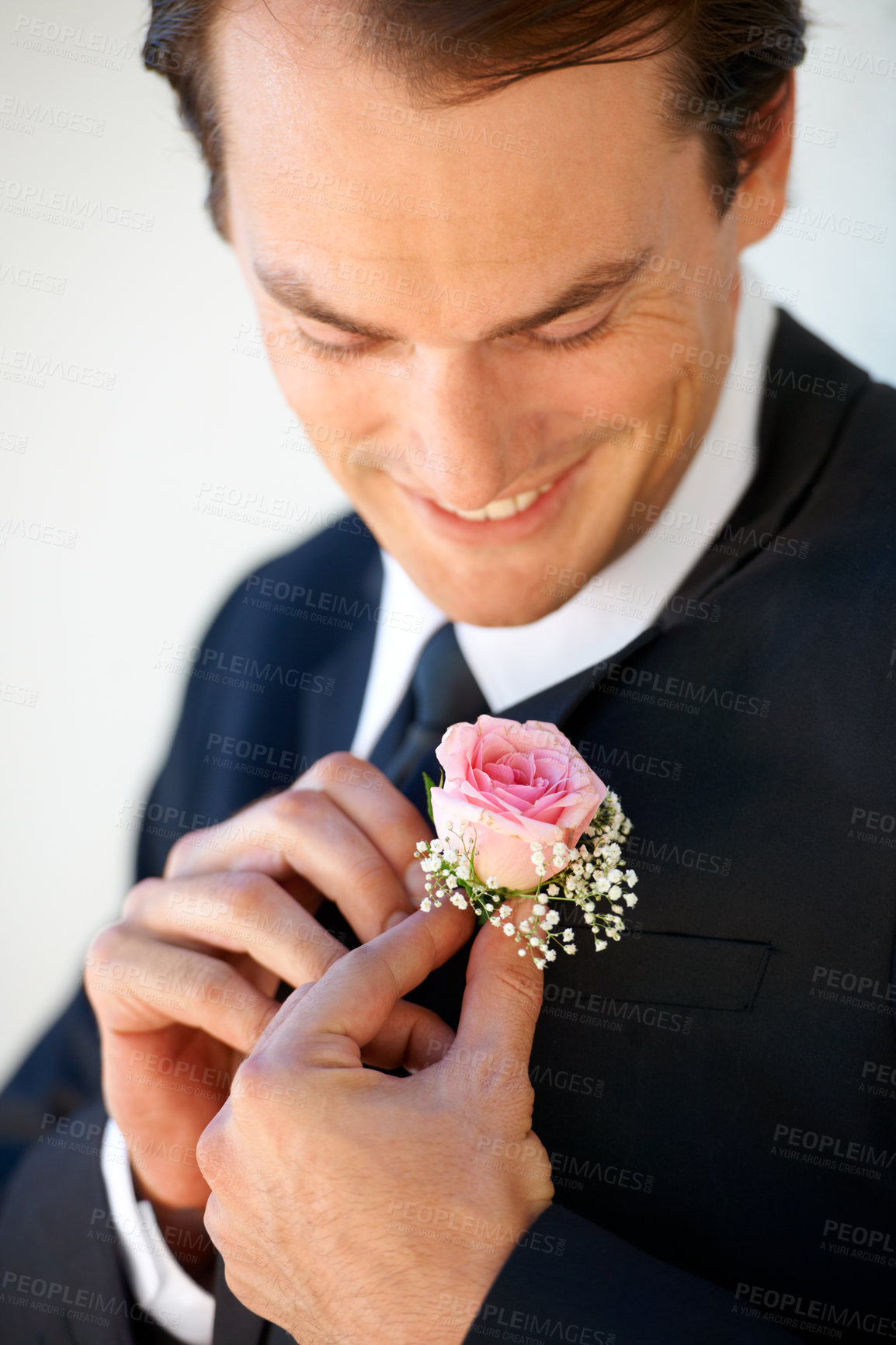 Buy stock photo Groom man, boutonniere or flowers with hands for suit for pride, smile or ready at wedding, party or celebration. Person, excited or rose on tuxedo for thinking, prepare or happy for marriage event