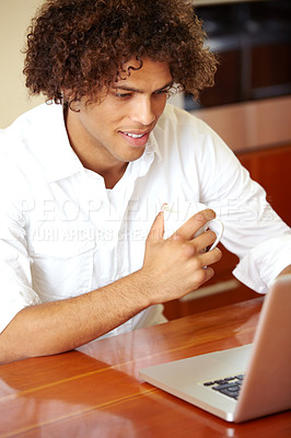 Buy stock photo Morning, laptop and man with coffee and remote work with email in a home. Table, online job and working freelancer with social media scroll and computer with a smile from internet search in a house