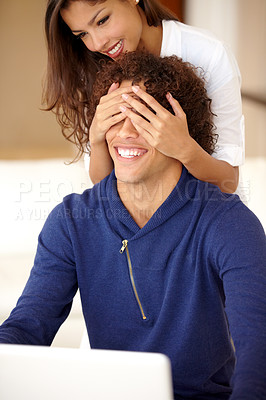 Buy stock photo Beautiful woman surprising her boyfriend at home