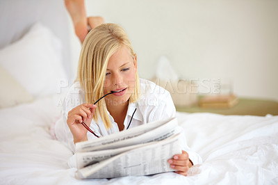 Reading Morning Paper Stock Images and Photos - PeopleImages