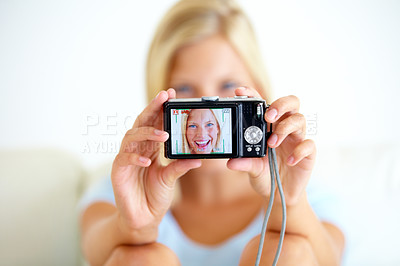 Buy stock photo Portrait, smile and woman with a digital camera, happiness and memory with break, excited or cheerful. Face, person or girl with equipment, photography or joyful with peace, screen or home with frame