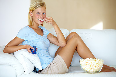 Buy stock photo Portrait, movie and watching tv with woman, popcorn and remote with happiness, relax and cheerful. Face, person and girl on a sofa, snack and streaming a film with joy, home or comedy with television