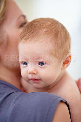 Buy stock photo Family, shoulder and mom with baby in home for bonding, loving relationship and affection. Love, bedroom and closeup of mother carrying newborn for child development, growth and care in nursery