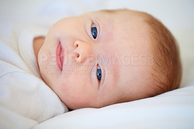 Buy stock photo Closeup, portrait and baby for wake up in bedroom for sleep, relax or peaceful in morning. Infant, happy or good dream from nap with calm, care or hope for child growth, cognitive and development